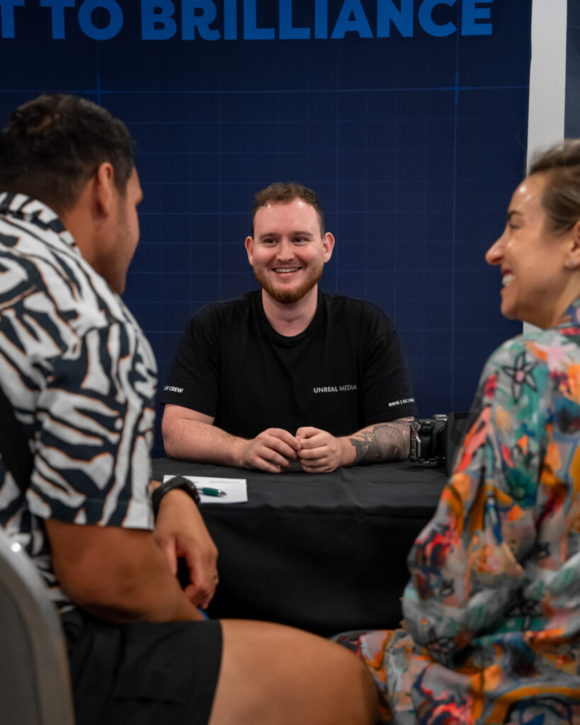 Jakob Quinn, the director of Unreal Media talking with people about video strategy Brisbane business owners can use.