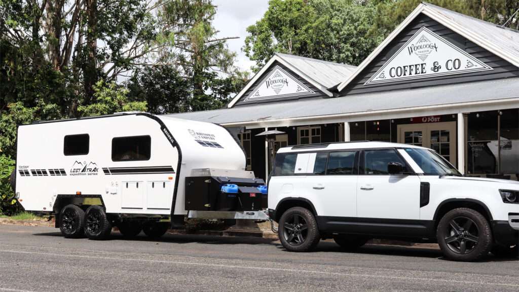 Rhinomax LT Vantage parked outside coffee shop.
