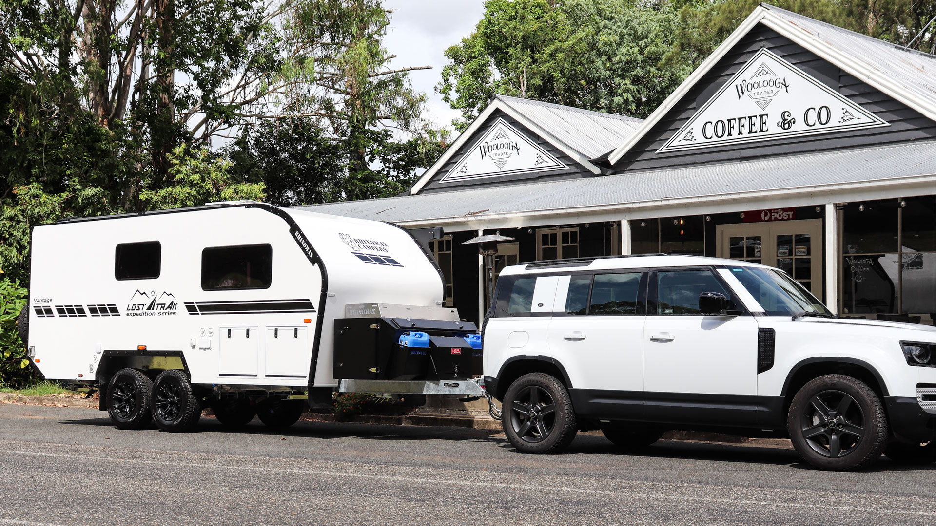 Rhinomax LT Vantage parked outside coffee shop.